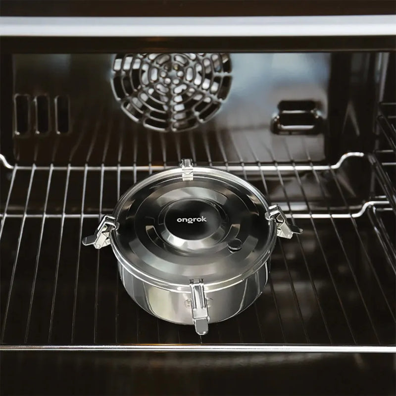 Ongrok's decarboxylation kit's stainless steel container in an oven.