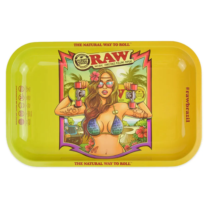 RAW's Brazil metal rolling tray. 11-inch by 7-inch sizing. A metal rolling tray with rounded lips and a bright and vibrant brazil inspired design. Bikini clad woman holding a RAW skateboard behind her head.