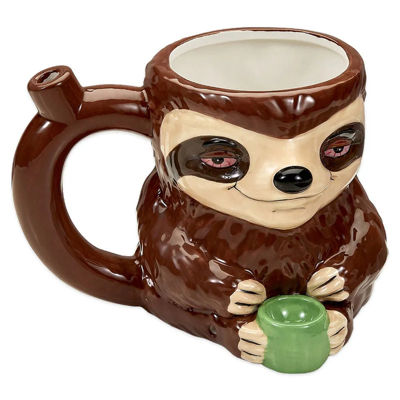 The sloth mug pipe is fully functional with a pipe and mouthpiece. This fun mug pipe is made of ceramic and features a laid-back brown sloth with large eyes and a stoned smile, holding a green bowl. Holds 16oz. of liquid.