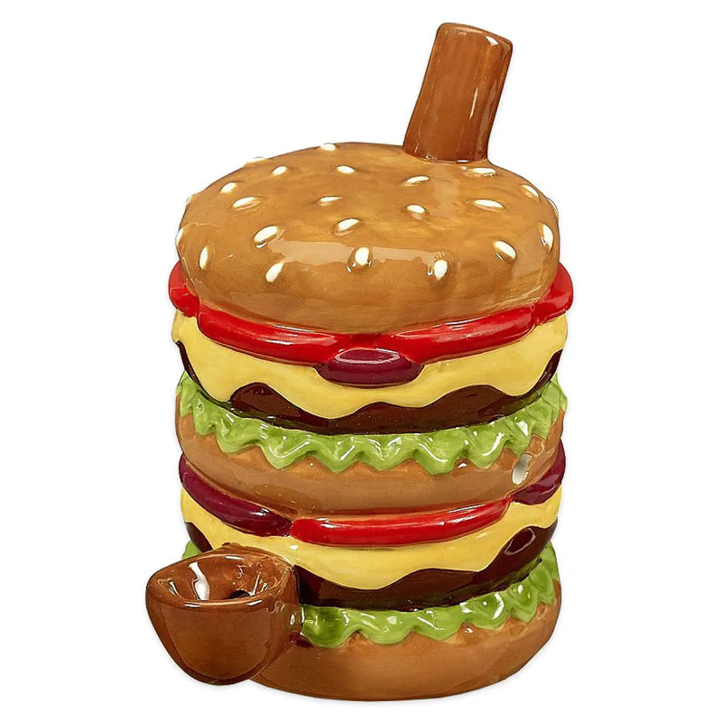 A smoking pipe made from ceramic in the shape of a double stacked hamburger.