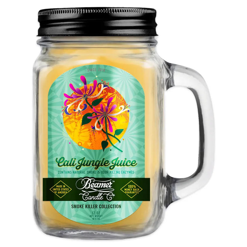 Beamer Candle Co 12oz candle. Yellowish orange wax, glass mason jar with reusable metal lid. Green beamer branded sticker with various jungle inspired flowers.