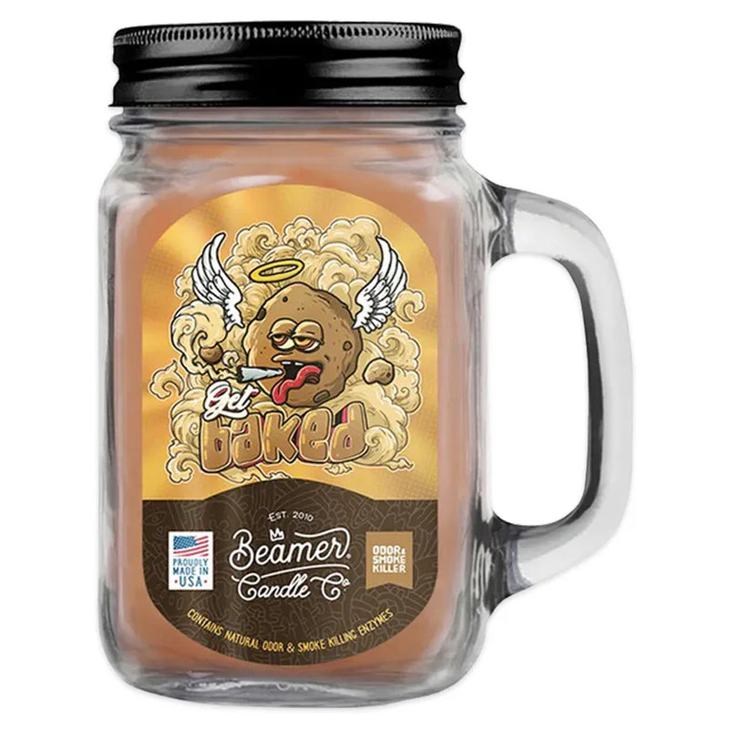 Beamer Candle Co 12oz candle in the Get Baked scent. Brown wax, reusable glass mason jar with a metal lid. Beamer branded sticker featuring an angel cooking smoking a joint.
