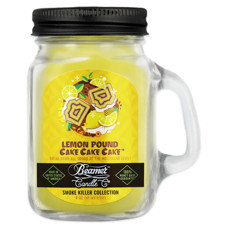 Beamer Candle Co's 4oz candle in a Lemon Pound Cake scent. Yellow wax, reusable glass mason jar with metal lid. The Beamer branded sticker features slices of lemon pound cake with lemon slices.