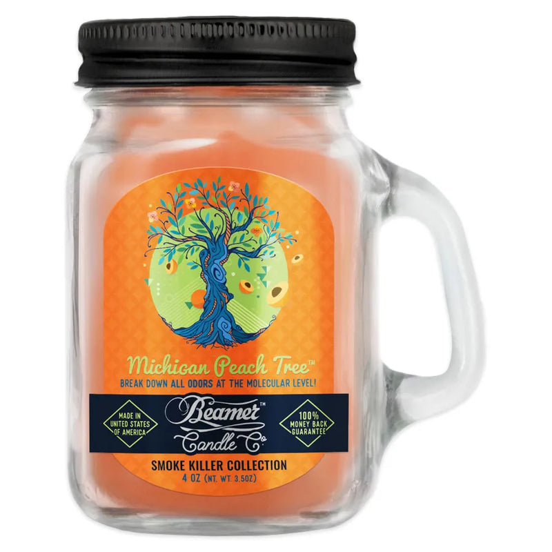 Beamer Candle Co's 4oz candle in a Michigan Peach Tree scent. Light orange wax, reusable glass mason jar with metal lid. Beamer branded sticker that features a twisted tree with falling peaches.