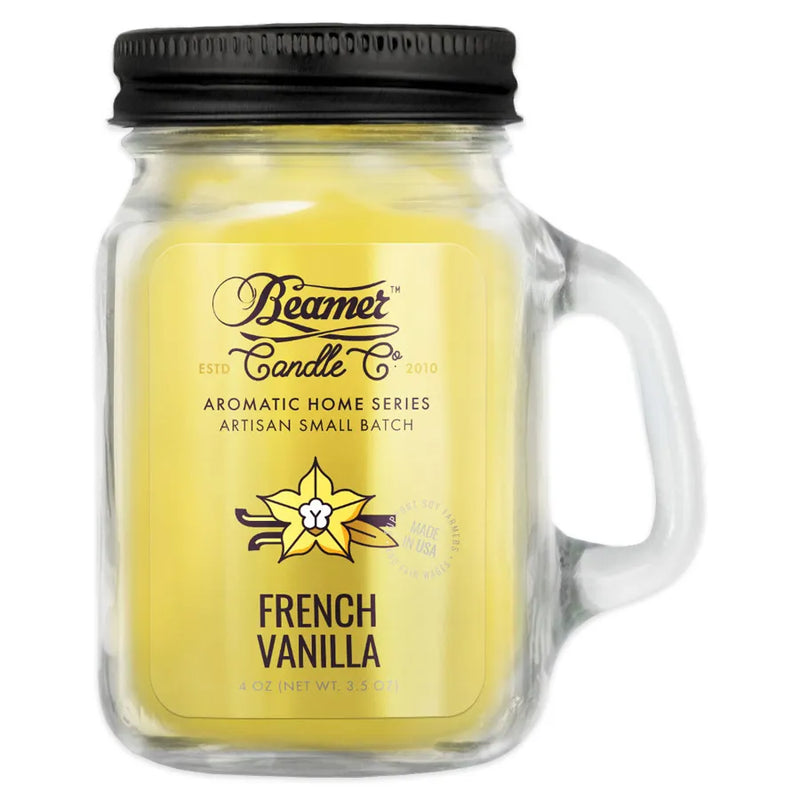 Beamer Candle Co's 4oz candle in a French Vanilla scent. Pale yellow wax, reusable glass mason jar with metal lid. The Beamer branded sticker features two vanilla beans behind a vanilla leaf.