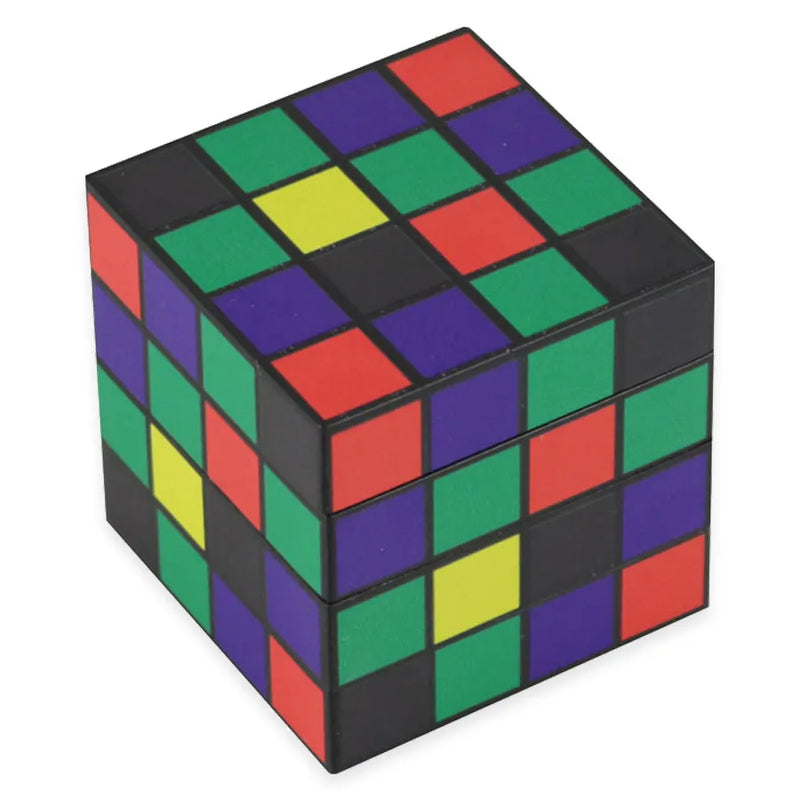 A 4 piece herb grinder in the shape of a classic cube toy. Closed and showcasing 3 sides of the cube with various coloured squares.