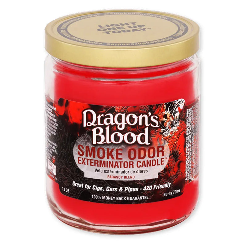 Smoke Odor's 13oz Jar Candle in a Dragon's Blood scent. Red wax, gold lid, glass jar. Smoke Odor branded sticker features a black white and red dragon decal.