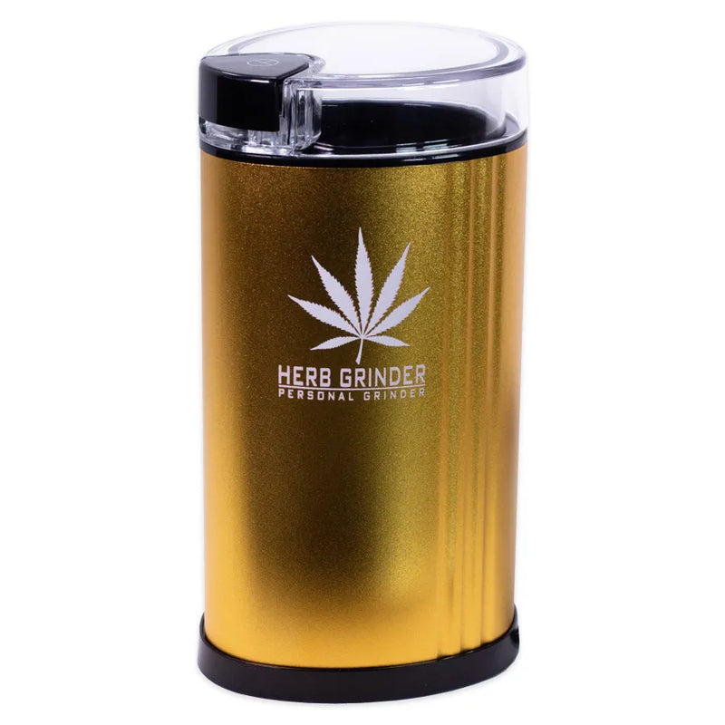 Version 2 of the Electric Herb Grinder. A more sleek and modern design. Weed leaf decal with the words Herb Grinder Professional Grinder on the base. Metallic gold colour and black power button.
