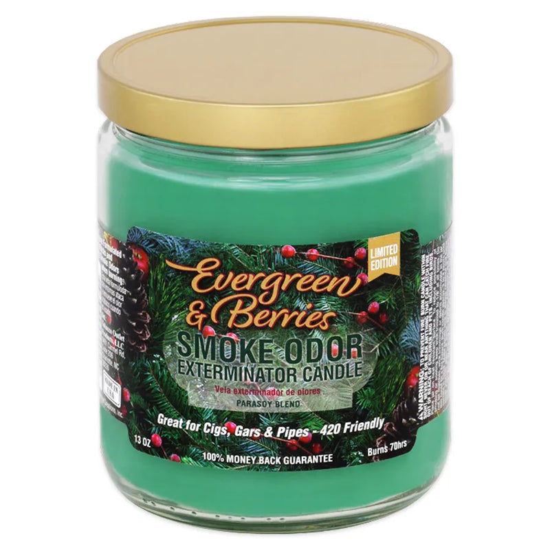 Smoke Odor's 13oz jar candle in a evergreen & berries scent. Evergreen coloured wax, gold lid, glass jar. The Smoke Odor branded sticker features a close up of evergreen leaves and cranberries strewn throughout.