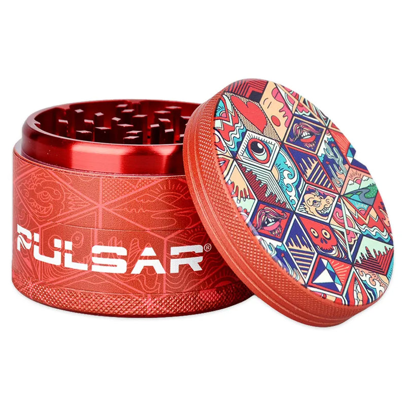 Pulsar's Design Series Metal Grinders featuring the Symbolic Tiles design, depicting a trippy cubic quilt pattern, with matching side art. Open grinder showcasing the magnetic lid and diamond-shaped cutting teeth second chamber.