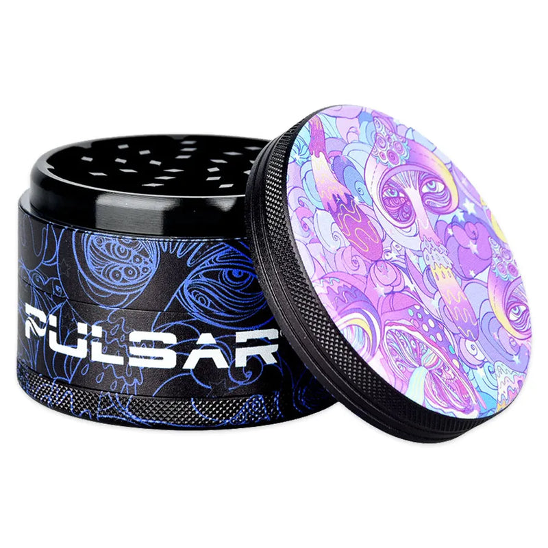 Pulsar's Design Series Metal Grinder featuring the Melting Shrooms design, depicting a swarm of neon mushrooms with wide, ancient eyes, with matching side art. Open grinder showcasing magnetic lid and sharp diamond-shaped cutting teeth second chamber.