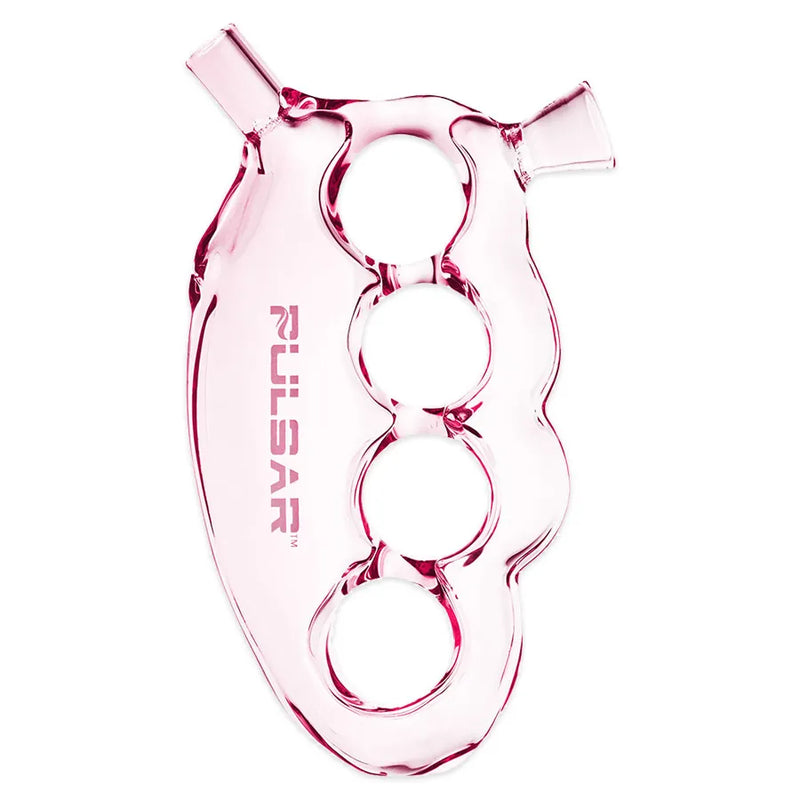 Pulsar's Knuckle Bubbler. A 5.5-inch glass pipe shaped as brass knuckles. Herb bowl over your index finger, mouthpiece under your index finger. Pink colour.