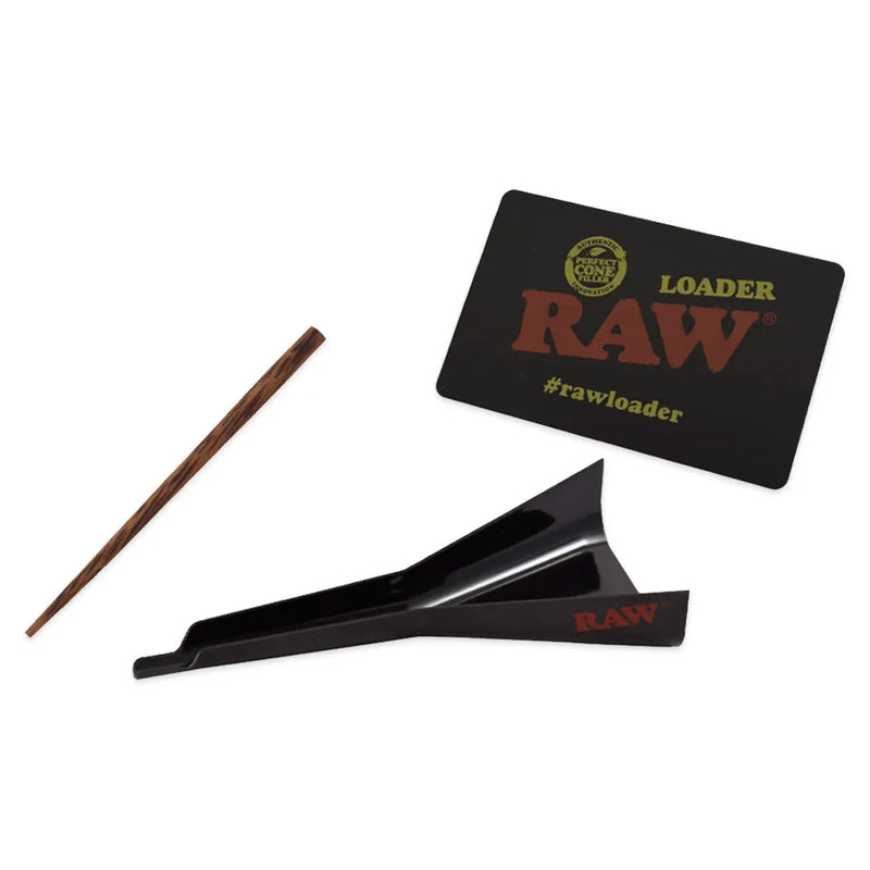 RAW's Loader. A plastic funnel that makes filling pre-rolled cones easier. Wooden poking tool and RAW loader branded scraping card.