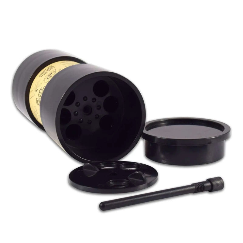 RAW's Six Shooter Cone Filler. Fits up to 6 1.25-Inch pre-rolled cones for easy filling. Open Six Shooter laying on its side. Showcasing the top storage lid, open rotating cover cap, tamping tool.
