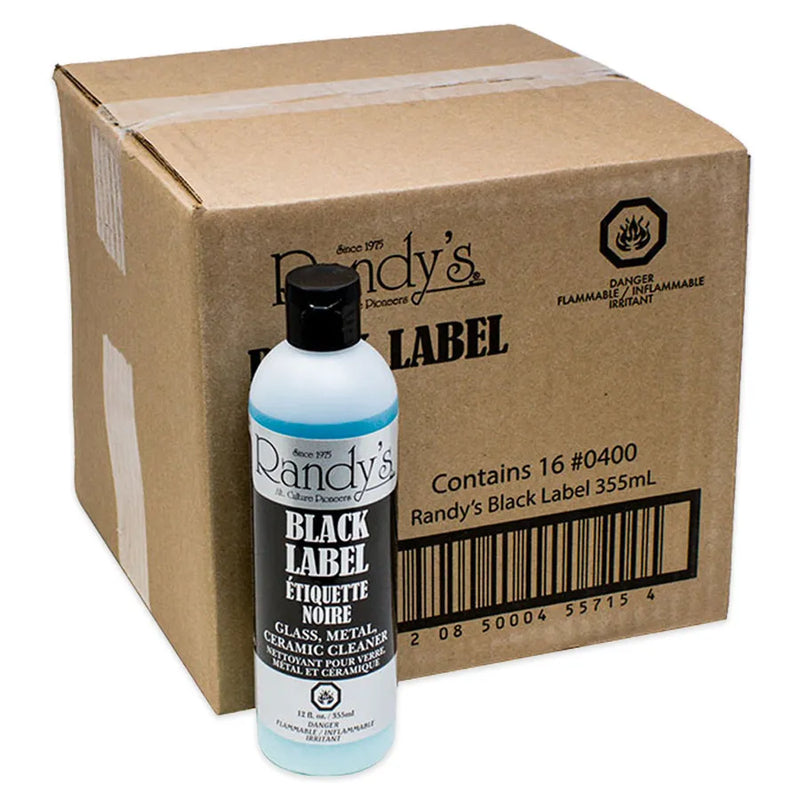 One 12oz bottle of Randy's Black Label Cleaner leaning against an unopened box containing 16 additional bottles of the same product.