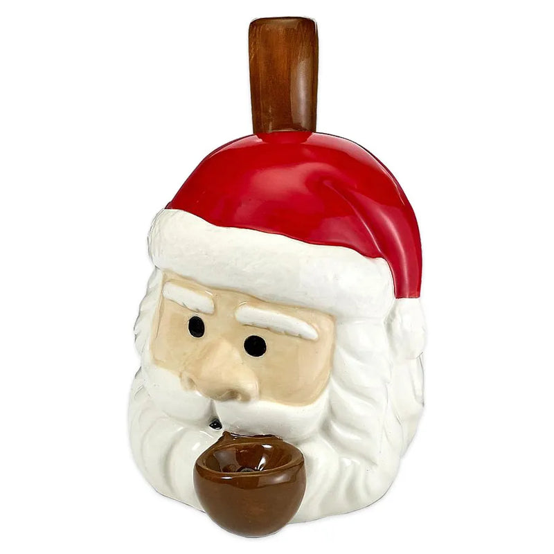 A smoking pipe made of ceramic in the shape of Santa Claus's head.