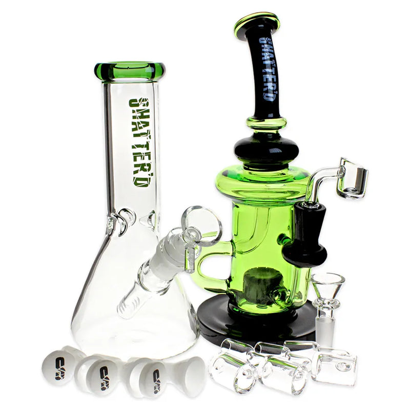 Shatter'd Glassworks Herb and Dab Package in a green colour. Basic beaker bong, full colour recycler rig, 3 dab bangers, and 3 dry-herb bowls.