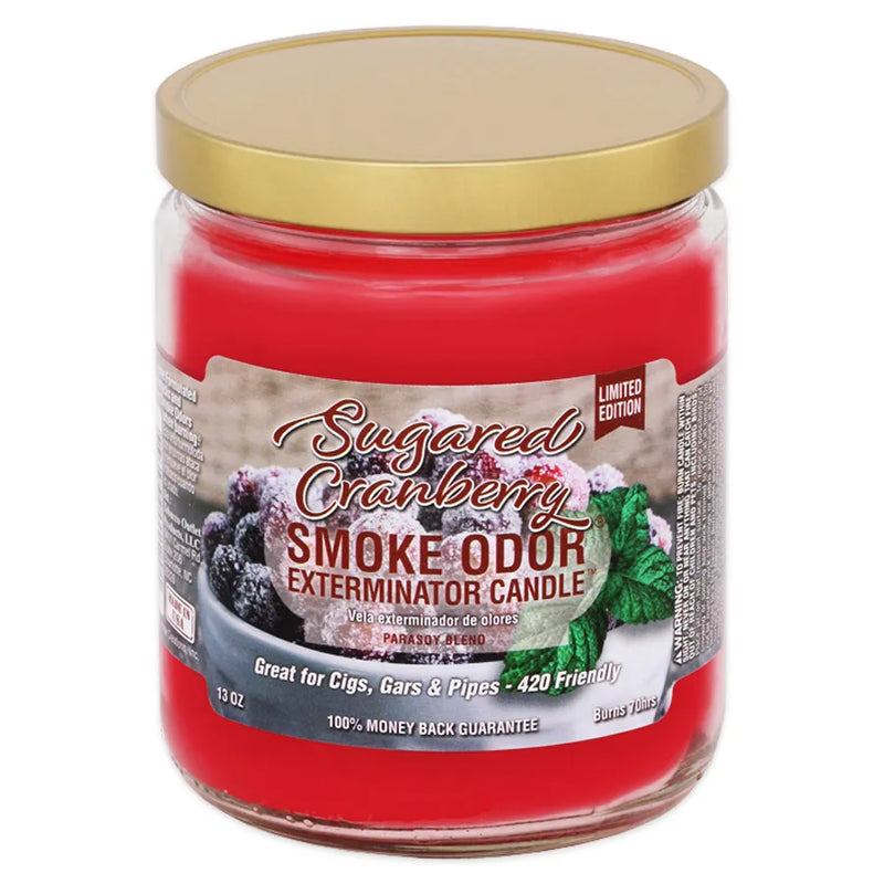 Smoke Odor's 13oz jar candle in a sugared cranberry scent. Red wax, gold lid, glass jar. The Smoke Odor branded sticker features frozen cranberries in a white ramekin. 